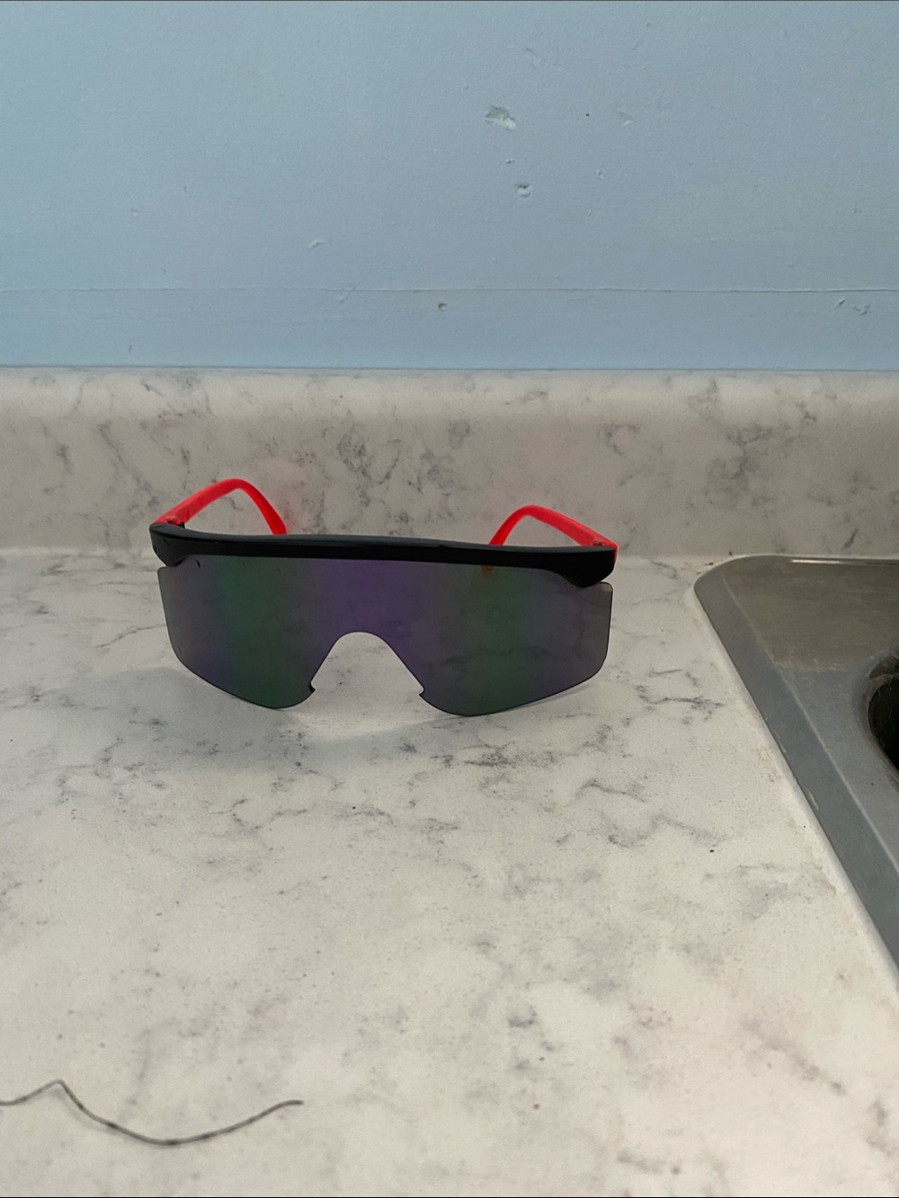 Oakley Shield Sunglasses with Black Lens and Red Temples